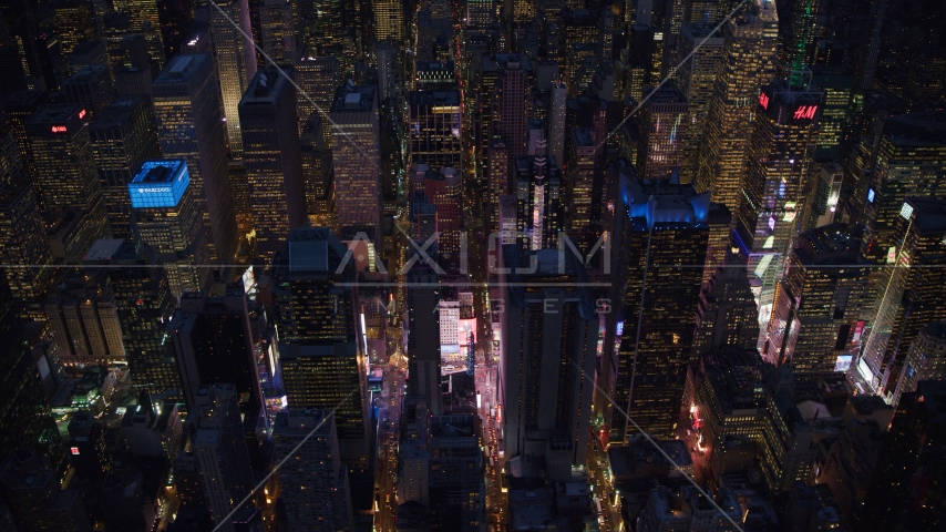 Midtown skyscrapers around Times Square at night, New York City Aerial Stock Photo AX121_133.0000007F | Axiom Images