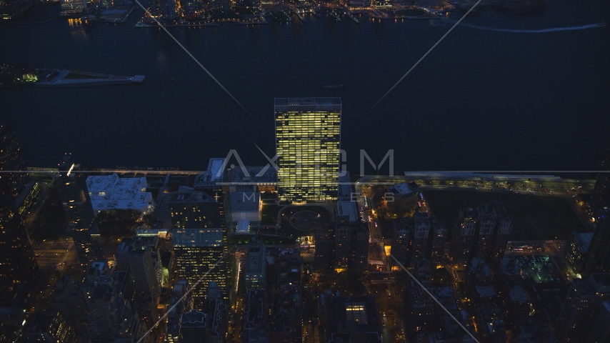 The United Nations by the East River at night in Midtown Manhattan, New York City Aerial Stock Photo AX121_138.0000309F | Axiom Images