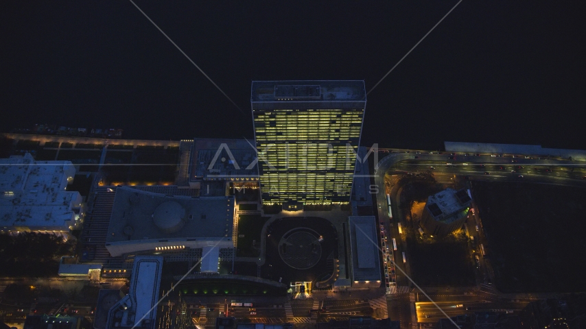 Bird's eye view of United Nations at night in Midtown Manhattan, New York City Aerial Stock Photo AX121_140.0000014F | Axiom Images