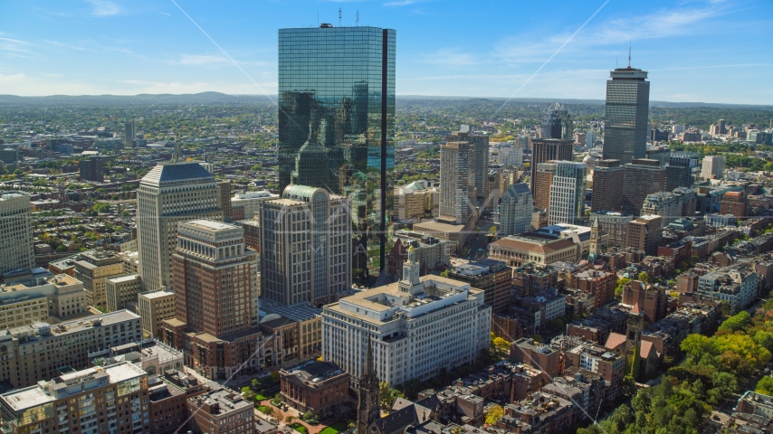 Towering skyscrapers and city buildings in Downtown Boston, Massachusetts Aerial Stock Photo AX142_201.0000209 | Axiom Images