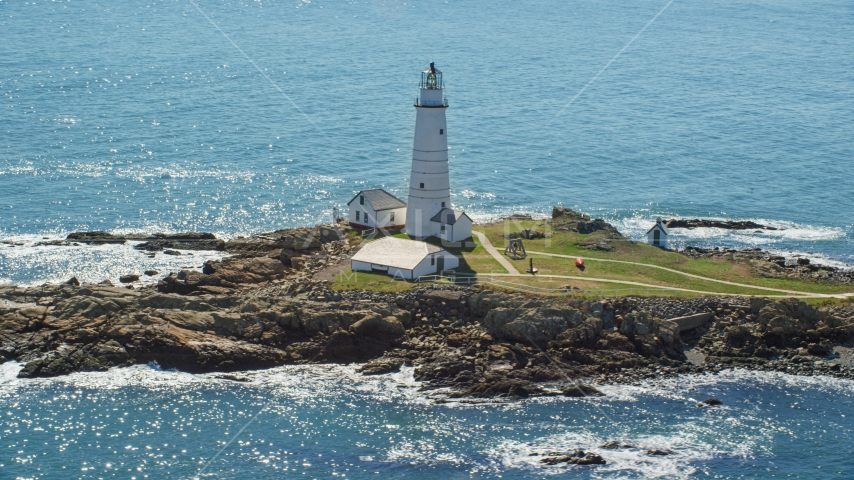 The Boston Light, located on Little Brewster Island, Boston Harbor, Massachusetts Aerial Stock Photo AX142_261.0000000 | Axiom Images