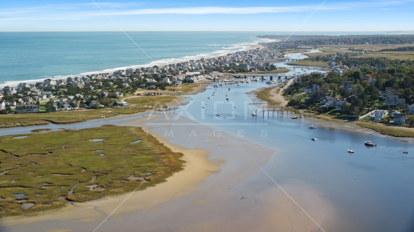 A small coastal community by Broad Creek, and a small bridge, Humarock, Massachusetts Aerial Stock Photo AX143_050.0000000 | Axiom Images