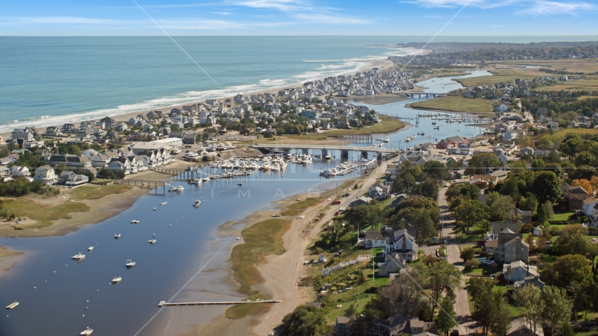 A small coastal community beside Broad Creek and a small bridge, Humarock, Massachusetts Aerial Stock Photo AX143_050.0000309 | Axiom Images