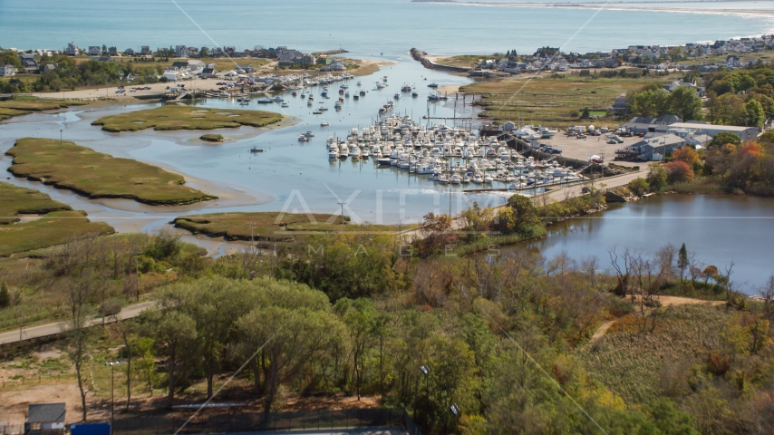 A small town marina in autumn, Marshfield, Massachusetts Aerial Stock Photo AX143_060.0000359 | Axiom Images