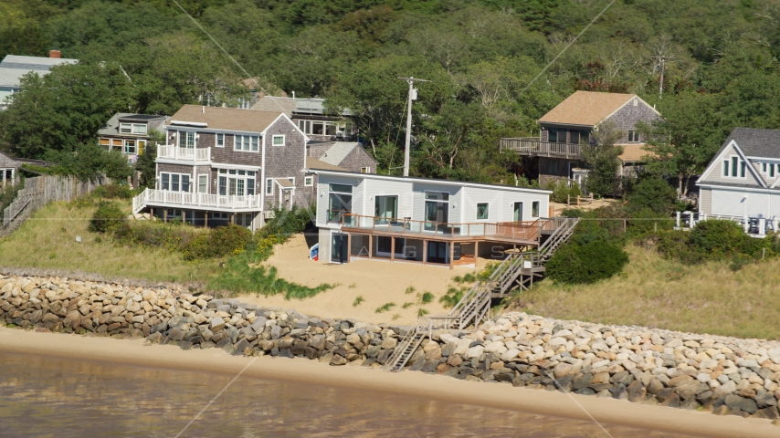 Raised beachfront homes on Cape Cod, Eastham, Massachusetts Aerial Stock Photo AX143_185.0000291 | Axiom Images