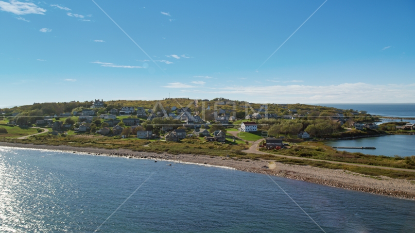 A coastal community on Cuttyhunk Island, Elisabeth Islands, Massachusetts Aerial Stock Photo AX144_173.0000000 | Axiom Images