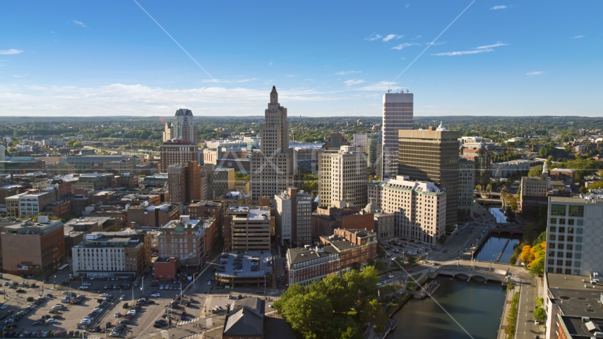 Tall skyscrapers by the river in Downtown Providence, Rhode Island Aerial Stock Photo AX145_036.0000016 | Axiom Images