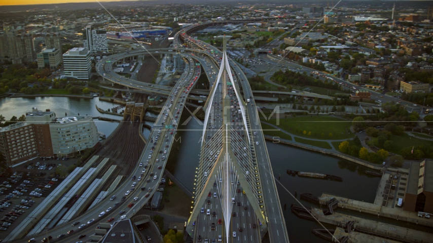 Traffic on the Zakim Bridge, Boston, Massachusetts, sunset Aerial Stock Photo AX146_088.0000113F | Axiom Images