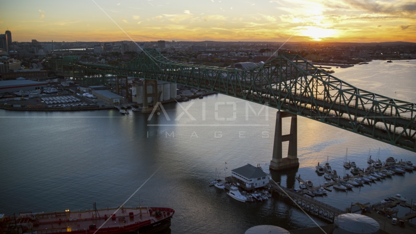 The Tobin Memorial Bridge in Chelsea, Massachusetts, sunset Aerial Stock Photo AX146_099.0000344F | Axiom Images