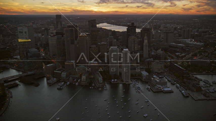 Waterfront skyscrapers at twilight in Downtown Boston, Massachusetts Aerial Stock Photo AX146_127.0000319F | Axiom Images