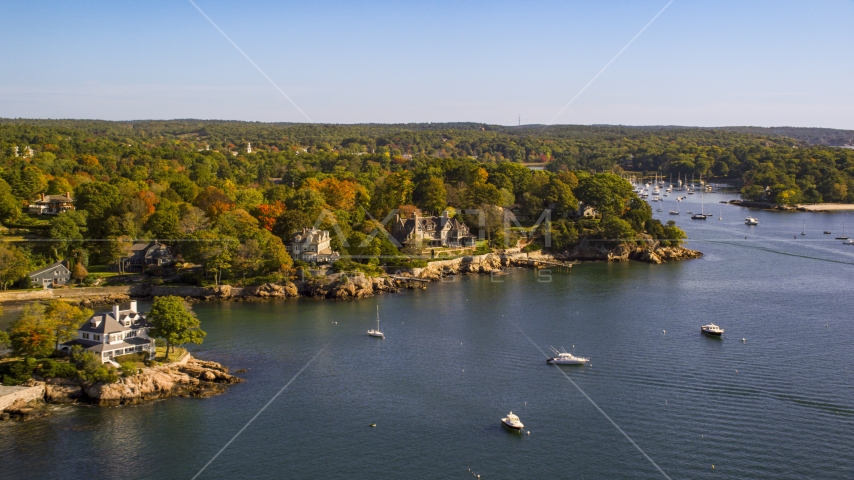 Oceanfront homes and trees with fall leaves, autumn, Manchester-by-the-Sea, Massachusetts Aerial Stock Photo AX147_060.0000221 | Axiom Images