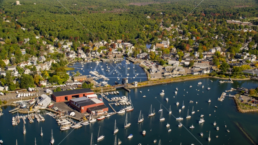 A harbor and coastal community surrounded by trees in autumn, Manchester-by-the-Sea, Massachusetts Aerial Stock Photo AX147_068.0000000 | Axiom Images