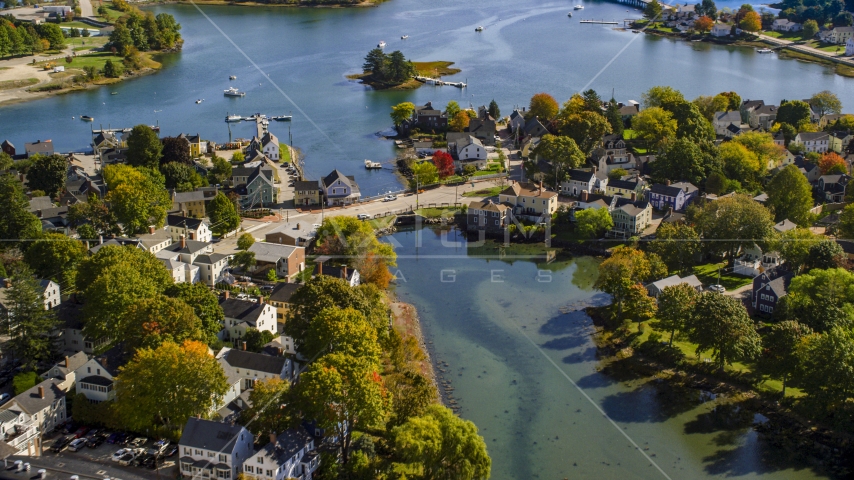 A small bridge and waterfront homes in autumn, Portsmouth, New Hampshire Aerial Stock Photo AX147_185.0000060 | Axiom Images