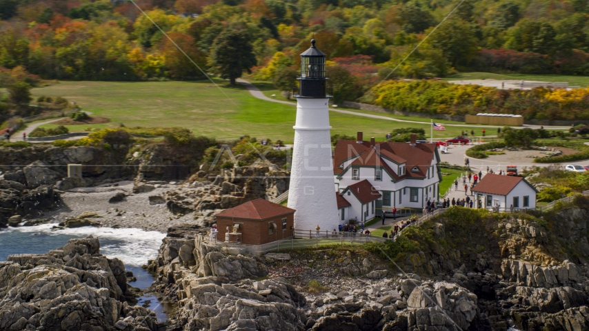 The Portland Head Light on the rocky coast in autumn, Cape Elizabeth, Maine Aerial Stock Photo AX147_313.0000000 | Axiom Images