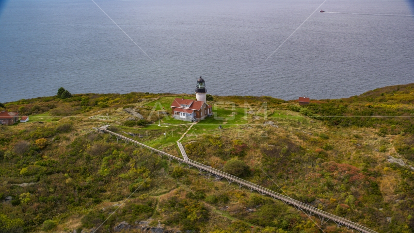 A view of Seguin Light on Seguin Island, autumn foliage, Phippsburg, Maine Aerial Stock Photo AX147_390.0000113 | Axiom Images