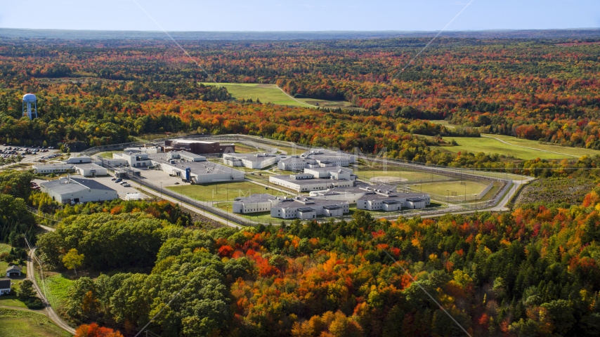 Maine State Prison by colorful forest, autumn, Warren, Maine Aerial Stock Photo AX148_064.0000000 | Axiom Images