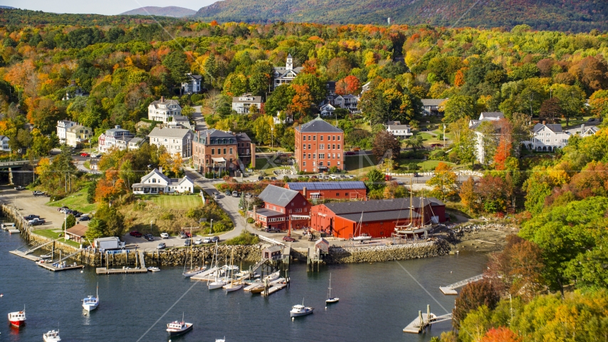 Boats in Rockport Harbor by small coastal town, Rockport, Maine Aerial Stock Photo AX148_094.0000121 | Axiom Images