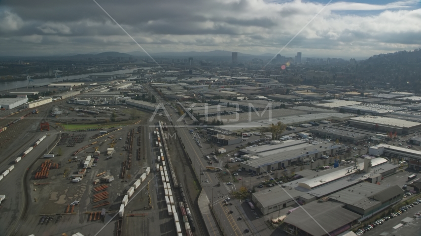 A train yard and warehouses in Northwest Portland, Oregon Aerial Stock Photo AX153_064.0000359F | Axiom Images