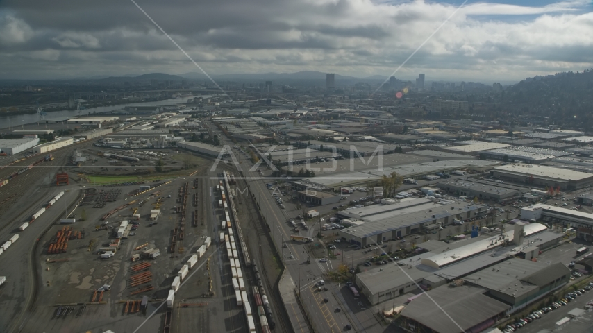 A train yard and warehouse buildings in Northwest Portland, Oregon Aerial Stock Photo AX153_065.0000000F | Axiom Images