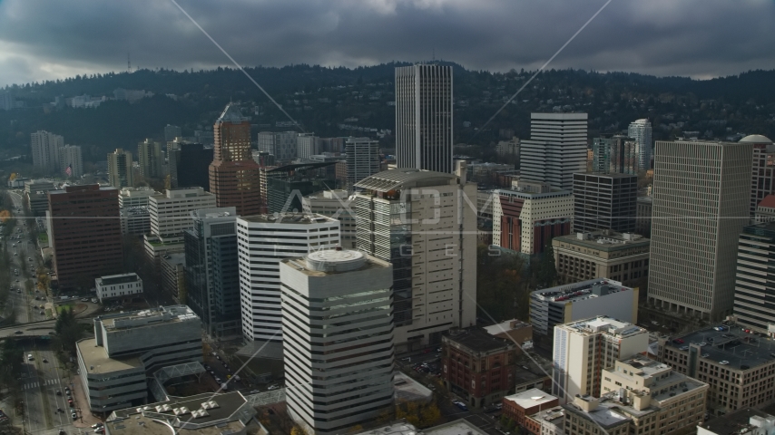 KOIN Center and Wells Fargo Center behind high-rises in Downtown Portland, Oregon Aerial Stock Photo AX153_071.0000368F | Axiom Images