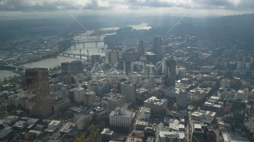 The Willamette River and bridges near skyscrapers in Downtown Portland, Oregon Aerial Stock Photo AX153_077.0000332F | Axiom Images