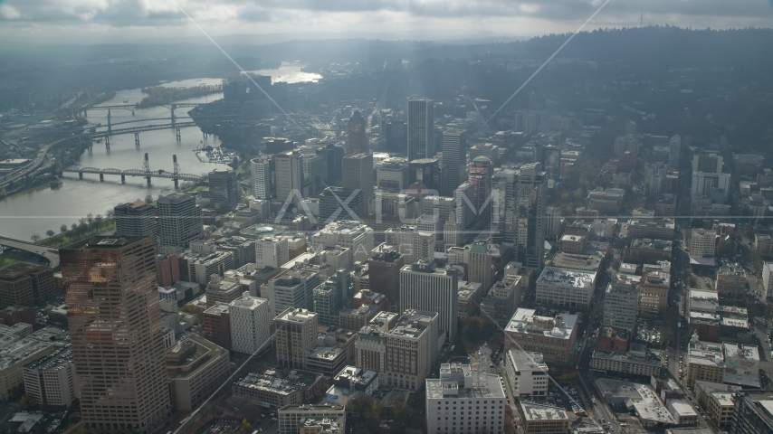 Godrays over the Willamette River and skyscrapers in Downtown Portland, Oregon Aerial Stock Photo AX153_078.0000152F | Axiom Images