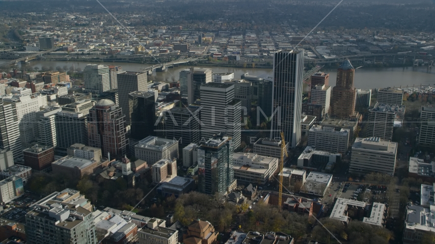 A group of skyscrapers near the Willamette River in Downtown Portland, Oregon Aerial Stock Photo AX153_088.0000265F | Axiom Images