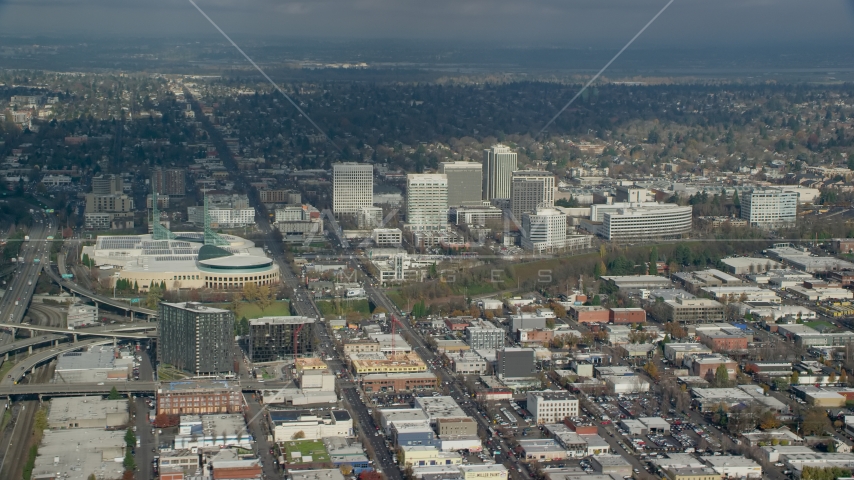 The Oregon Convention Center near office buildings in Lloyd District of Portland, Oregon Aerial Stock Photo AX153_091.0000094F | Axiom Images