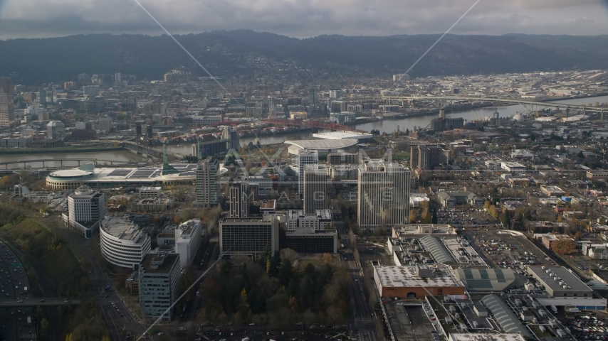 Convention center and office buildings near Moda Center and the Willamette River, Portland, Oregon  Aerial Stock Photo AX153_111.0000000F | Axiom Images