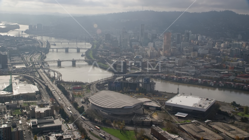 Bridges over the Willamette River, skyscrapers in Downtown Portland, and Moda Center in Oregon Aerial Stock Photo AX153_113.0000312F | Axiom Images