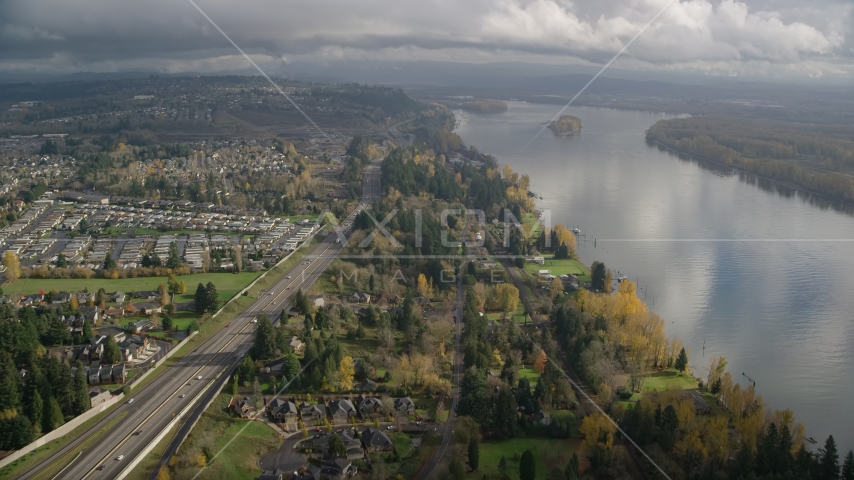 Suburban houses between Highway 14 and Columbia River, Vancouver, Washington Aerial Stock Photo AX153_143.0000253F | Axiom Images