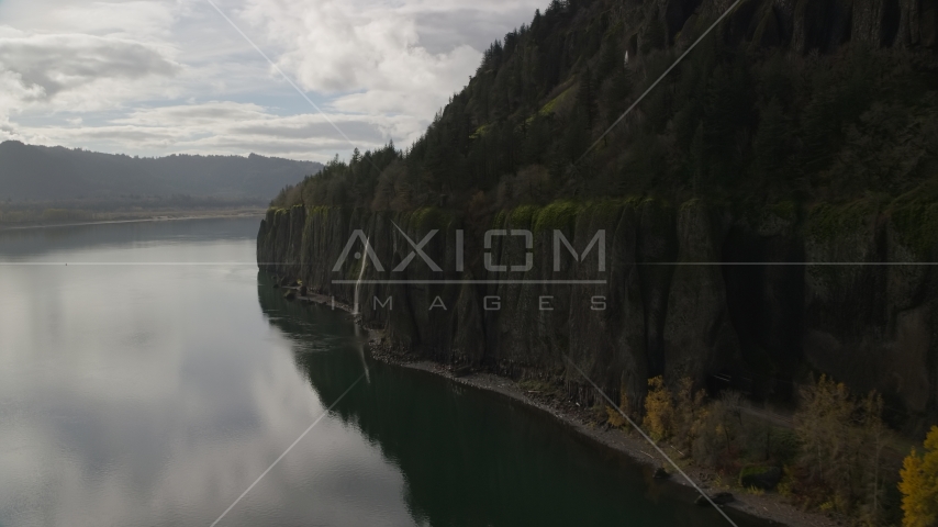 A waterfall on a cliff in Columbia River Gorge, Washington Aerial Stock Photo AX154_009.0000336F | Axiom Images