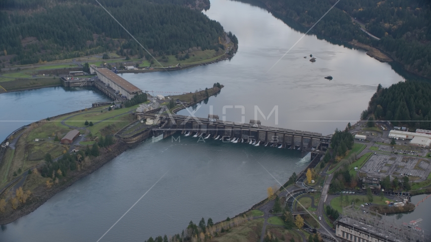 Bonneville Dam structures in the Columbia River Gorge Aerial Stock Photo AX154_038.0000311F | Axiom Images