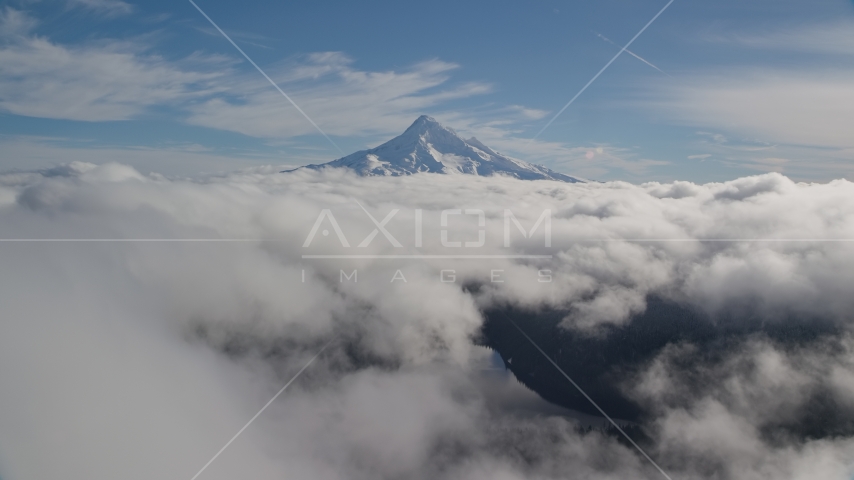 Cloud layer near snowy Mount Hood, Cascade Range, Oregon Aerial Stock Photo AX154_062.0000242F | Axiom Images