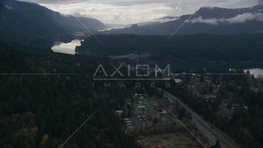 Evergreens by Interstate 84 in the town of Cascade Locks, Oregon in Columbia River Gorge Aerial Stock Photo AX154_170.0000035F | Axiom Images