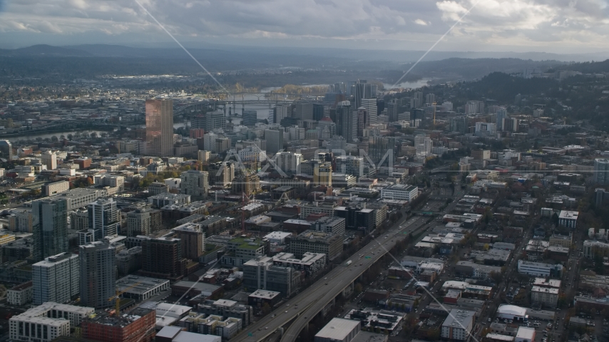 A view of skyscrapers and Interstate 405 in Downtown Portland, Oregon Aerial Stock Photo AX154_228.0000285F | Axiom Images