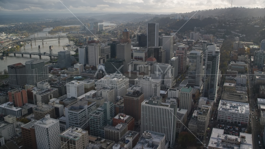 Downtown skyscrapers and bridges spanning the river in Downtown Portland, Oregon Aerial Stock Photo AX154_243.0000355F | Axiom Images