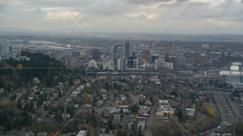 Downtown Portland skyscrapers seen from the south side of the city in Oregon Aerial Stock Photo AX155_020.0000000F | Axiom Images