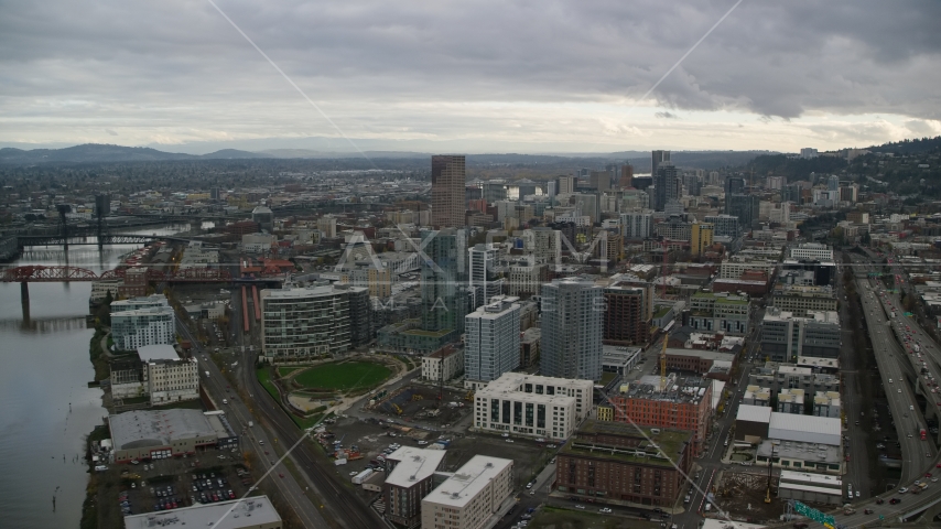 Fremont Bridge skyscrapers in Downtown Portland, Oregon Aerial Stock Photo AX155_036.0000383F | Axiom Images