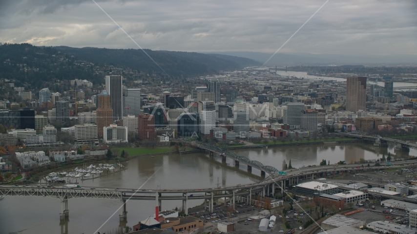 Ross Island Bridge, the Hawthorne Bridge, and skyscrapers in Downtown Portland, Oregon Aerial Stock Photo AX155_046.0000196F | Axiom Images