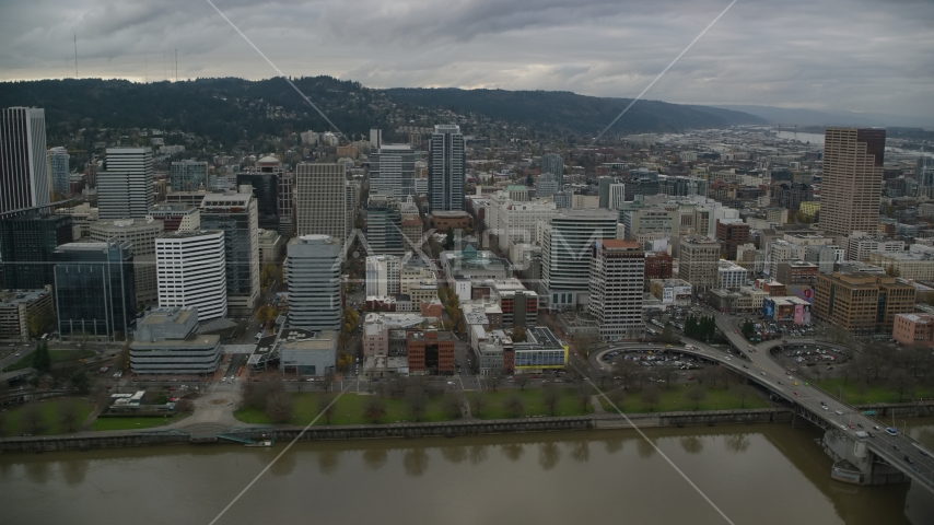 Skyscrapers, downtown buildings, and city park near the river in Downtown Portland, Oregon Aerial Stock Photo AX155_051.0000183F | Axiom Images