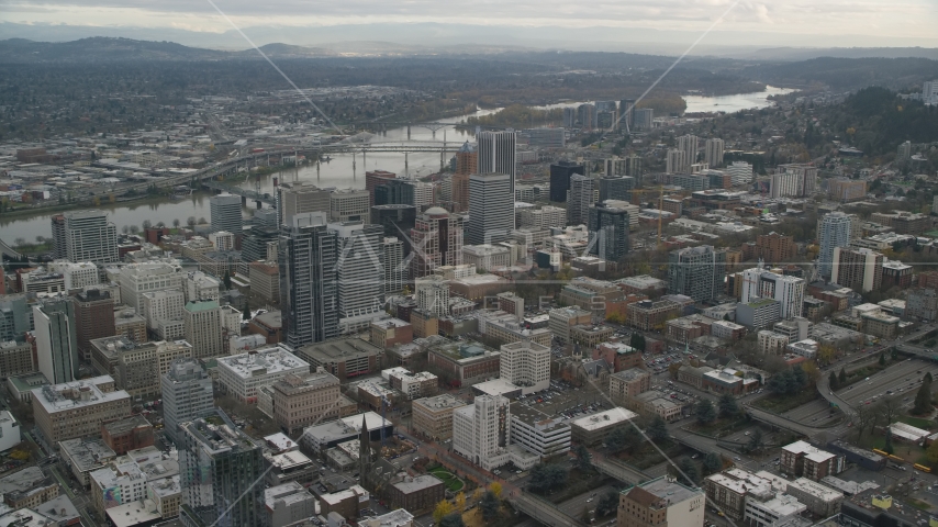 Downtown Portland cityscape with Willamette River behind it in Oregon Aerial Stock Photo AX155_100.0000313F | Axiom Images