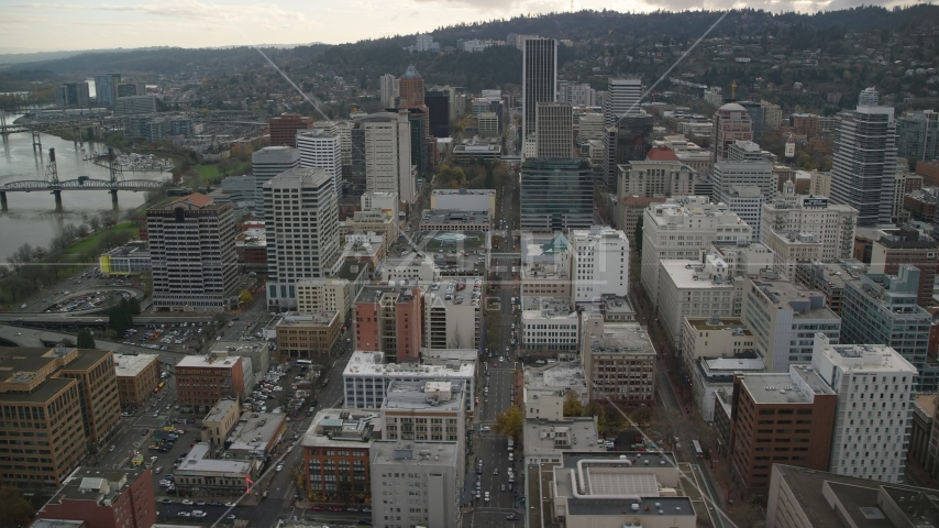 Top of US Bancorp Tower, and city streets and skyscrapers in Downtown Portland, Oregon Aerial Stock Photo AX155_113.0000181F | Axiom Images