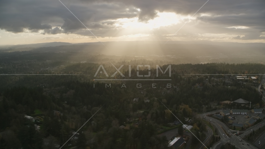 Godrays shining on neighborhoods and Highway 26, Southwest Portland, Oregon Aerial Stock Photo AX155_118.0000000F | Axiom Images