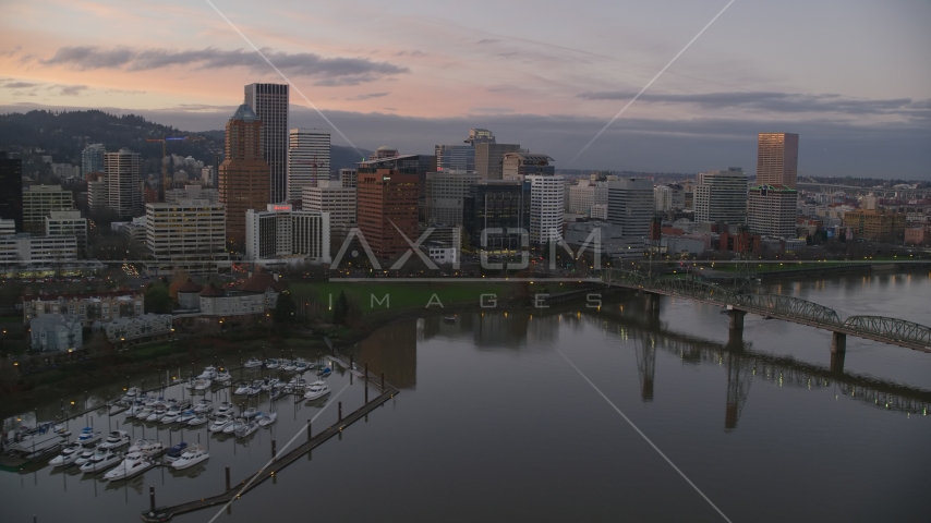 Marquam Bridge, marina, Hawthorne Bridge, and downtown skyline at sunset, Downtown Portland, Oregon Aerial Stock Photo AX155_201.0000355F | Axiom Images