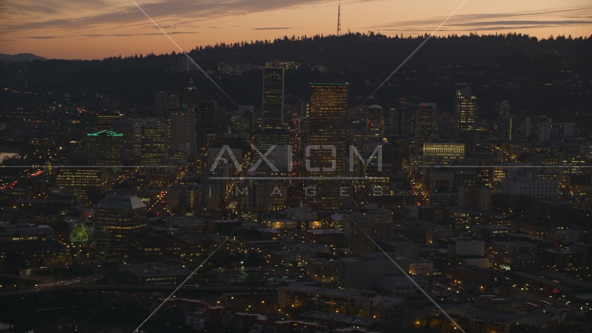 US Bancorp Tower and downtown skyscrapers at sunset, Downtown Portland, Oregon Aerial Stock Photo AX155_258.0000131F | Axiom Images