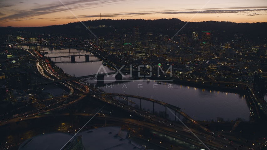 Willamette River, bridges and Downtown Portland, Oregon at sunset Aerial Stock Photo AX155_277.0000100F | Axiom Images