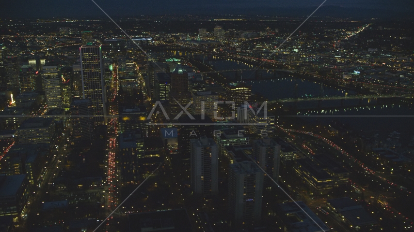 Wells Fargo Center and KOIN Center near the river at night in Downtown Portland, Oregon Aerial Stock Photo AX155_289.0000295F | Axiom Images