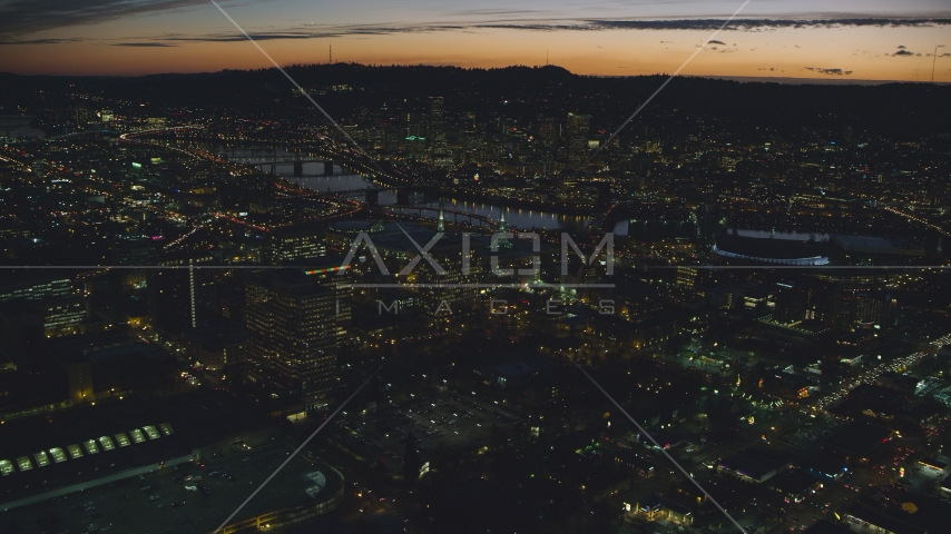 Office buildings, convention center, Willamette River, Downtown Portland, Oregon, night Aerial Stock Photo AX155_299.0000208F | Axiom Images