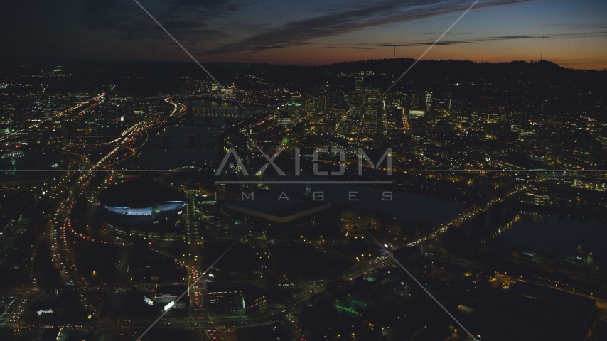 Moda Center, Memorial Coliseum by the Willamette River, Downtown Portland, Oregon, night Aerial Stock Photo AX155_312.0000000F | Axiom Images